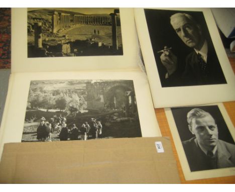 Folio containing a quantity of large format photographs by G.T. Whiting including portraits, armorials and scenes of filming 