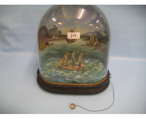 Musical automaton in the form of a three masted ship under a glass dome, painted with a seascape, 14.5ins high