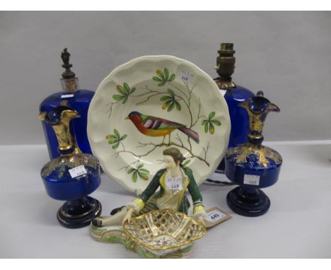 Porcelain figure reclining with a basket (a/f), pottery plate painted with a bird and a pair of Victorian blue glass jug vase