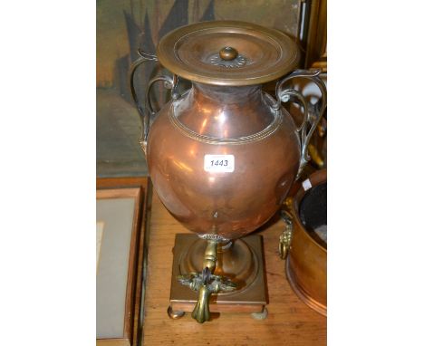 19th Century copper and brass mounted Samovar together with an oval planter with lion ring handles