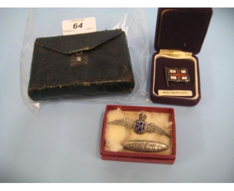 Silver mounted leather playing card case, silver and enamel R.A.F. wings, silver and marcasite R.N.L.I. badge and a silver ba