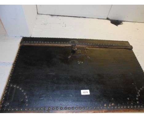 19th Century black linen covered and brass studded trunk