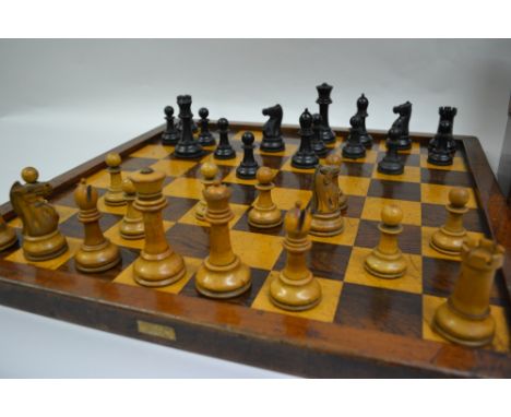 Jaques Staunton pattern boxwood and ebony thirty two piece chess set, in original box with rosewood and sycamore competition 