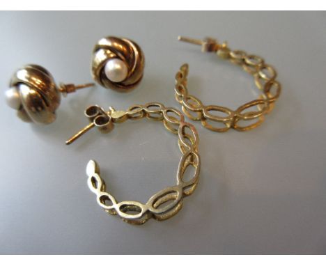 Pair of yellow gold hoop earrings and another pair of pearl set ear studs