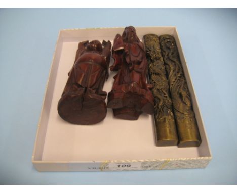 Two Chinese carved hardwood figures and two resin scroll weights