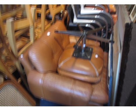 Mid 20th Century Swedish buttoned leather upholstered swivel easy chair on a laminate frame by Moben together with a similar 