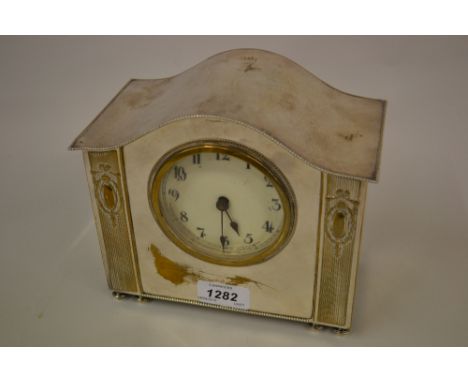 W.M.F. mantel clock, the electroplated brass case enclosing an enamel dial with Arabic numerals and fixed key wind movement