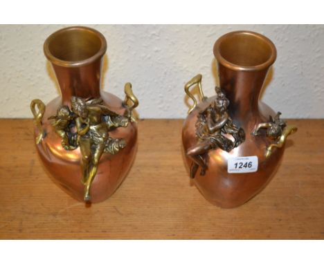 Pair of French Art Nouveau coppered two handled vases mounted with spelter figures of females and cherubs (a/f), 10ins high
