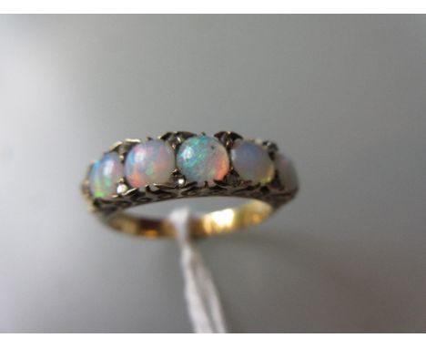 Yellow gold five stone opal and diamond carved half hoop ring