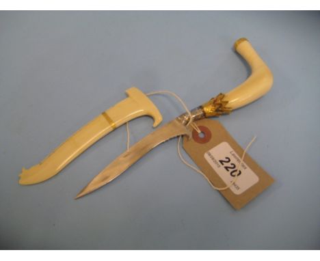 Small Middle Eastern ivory and steel dagger with yellow metal mounts