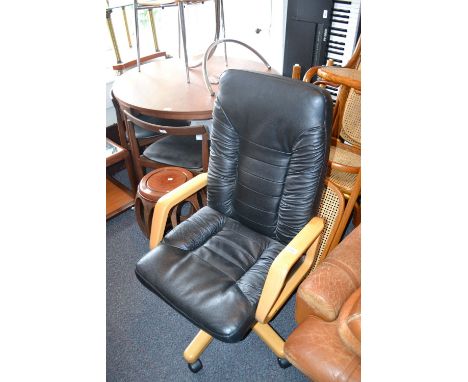 20th Century black leather upholstered swivel office armchair