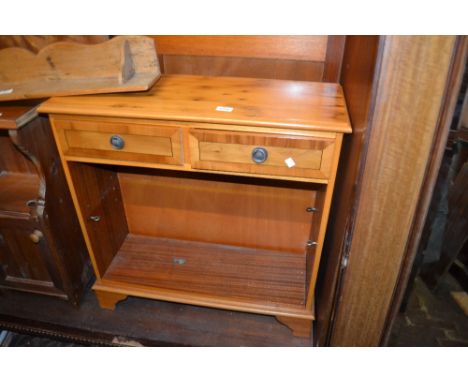 Reproduction yew wood side cabinet having two drawers above an adjustable shelf on bracket feet