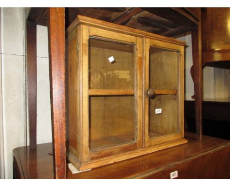 Early 20th Century mahogany and pine two door wall cabinet with knob handle and single shelf