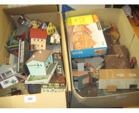 Two boxes containing a quantity of various 00 and H0 scale model railway buildings