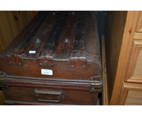 19th Century painted faux wood dome top travel trunk together with another similar smaller trunk
