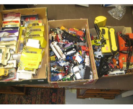 Three boxes containing a quantity of various die-cast vehicles including: Tonka, Matchbox, Corgi etc, some boxed