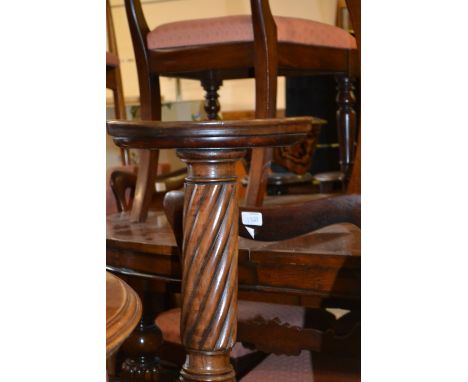 19th Century mahogany bedpost torchere with circular dish top and tripod base