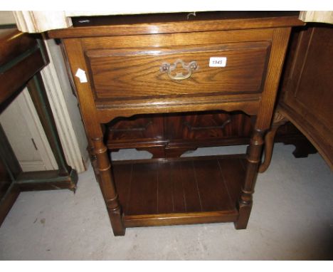 Reproduction oak side table with single drawer on turned supports with stretchers, together with another similar side table a