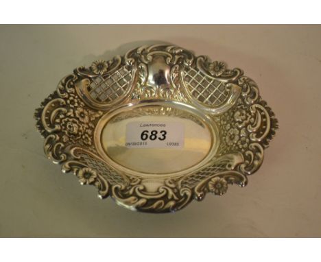 Birmingham silver trinket dish of oval pierced embossed design