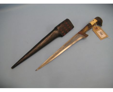 Afghan dagger with a bone and inlaid wooden grip and a leather scabbard