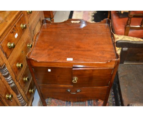 George III mahogany tray top commode with two doors above a drawer on square cut supports