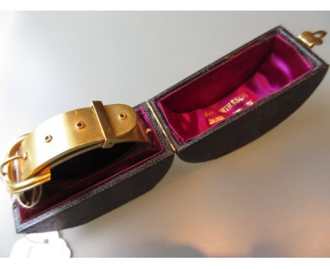 Victorian gilt metal buckle form bangle in original box