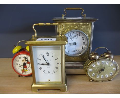 Gilt brass carriage clock by Bayard together with three other various clocks, bronzed resin bust of Queen Victoria together w