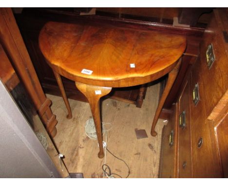 Mid 20th Century walnut half round side table and a pair of light oak overdoors