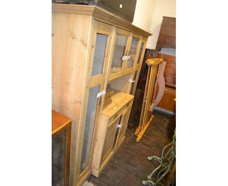Large late 19th / early 20th Century stripped pine kitchen side cabinet, the moulded cornice above an arrangement of various 