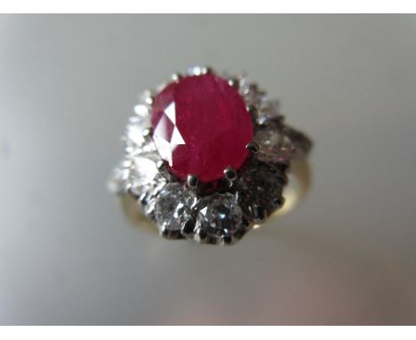18ct Yellow gold oval ruby and diamond cluster ring