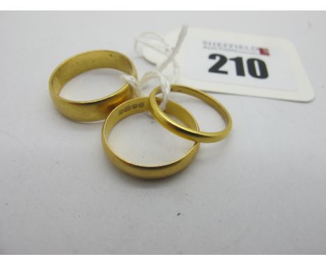 Three 22ct Gold Plain Wedding Bands, of various widths (finger sizes noted K, O, R) (total weight 11 grams).