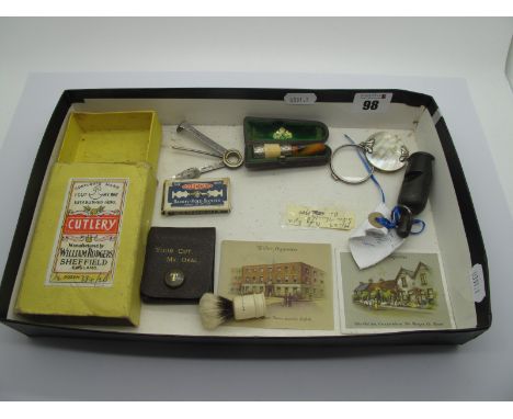 A Vintage L&amp;N.E.R Whistle, a magnifying glass with shell cover, a small Culmak shaving brush, a cheroot holder with appli
