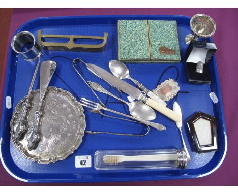 A Hallmarked Silver Topped Glass Travel Jar, containing a toothbrush, assorted plated cutlery, hallmarked silver handled butt