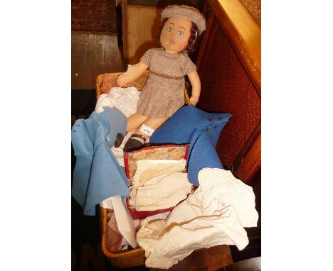 Vintage fabric doll with clothes and small homemade suitcase with contents 