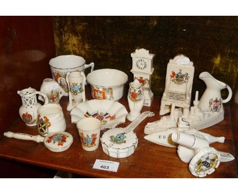 Collection of crested china including a battleship, submarine, cannon and banjo, etc 