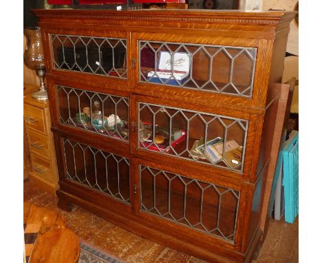 Early 20thc oak sectional stacking bookcase with astragal glazed doors (3 sections , base and cornice), 48"W x 48"H