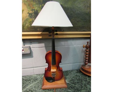 A violin form lamp with shade, 67cm tall