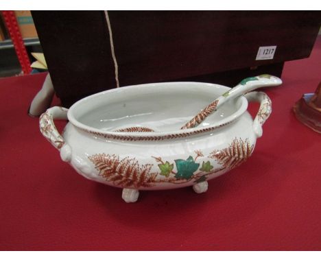 A Meissen style sauce bowl and ladle with leaf and floral design