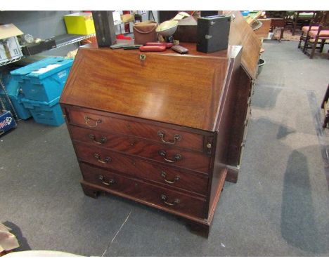 A George III mahogany four drawer bureau with key on bracket feet, 102cm tall x 91cm wide x 53cm deep 