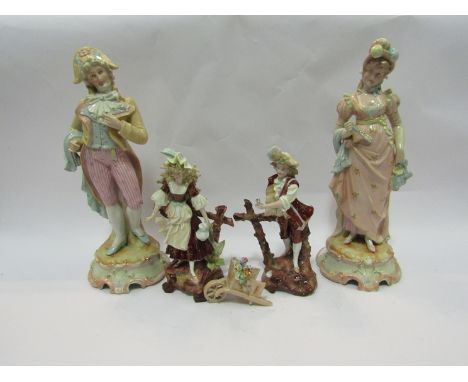 A pair of Continental porcelain figures of lady and gent marked "K" to base and a pair of porcelain figures of boy and girl c
