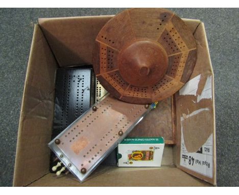 A set of dominoes with cribbage board top, three further cribbage boards, copper and Perspex, brass and treen, etc