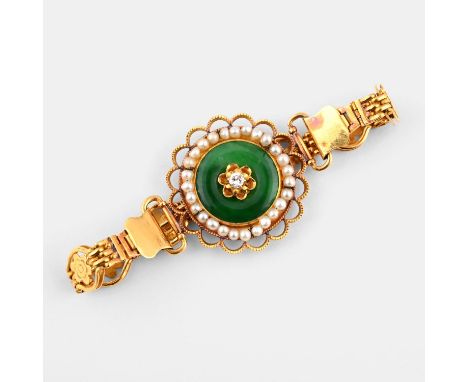 the central jade disc is mounted with a circular-cut diamond within a surround of cultured pearls, on a gold fancy link brace