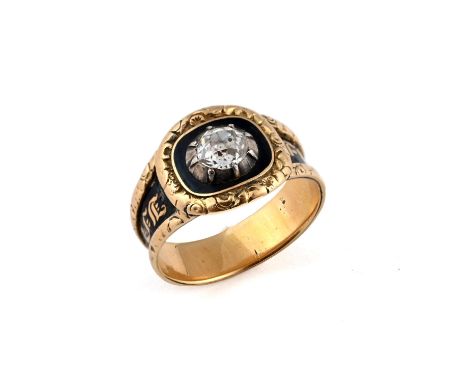 centred with a cushion-shaped diamond within a surround of black enamel and gold foliate decoration, inscribed to the inside 