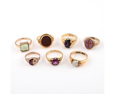 the oval-shaped amethyst is set in 18ct gold, size S, together with an opal and gold single stone ring, size T, a green glass