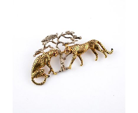 depicting two leopards sitting under a tree, both with ruby eyes, 7.5cm long, 19.9 grams. ** Some wear, but no obvious damage