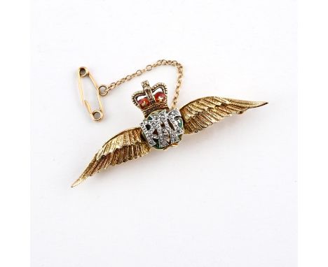 mounted with rose-cut diamonds, with red and green enamel decoration, 5.2cm long, 5.8 grams. ** There is some damage to the e