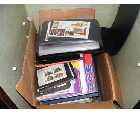 A large collection of GB First Day Covers, Presentation packs in albums, loose and Mint stamps