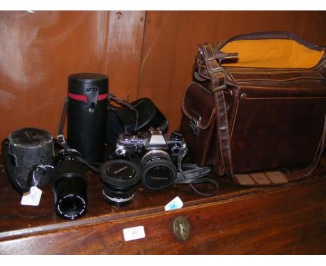 A quantity of vintage photographic equipment, including Olympus camera 