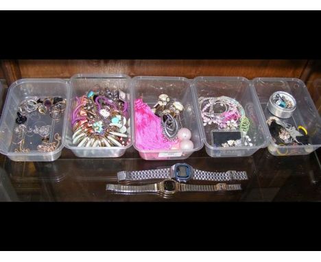 An assortment of costume jewellery, including rings, earring, necklaces and two Casio watches etc.