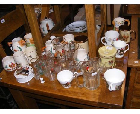 An assortment of hunting motif china and glassware 